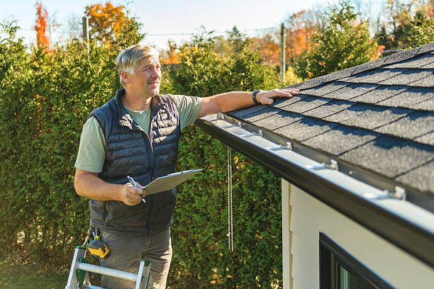 Professional Hail Damage Roof Repair technician working in Berkshire, NY